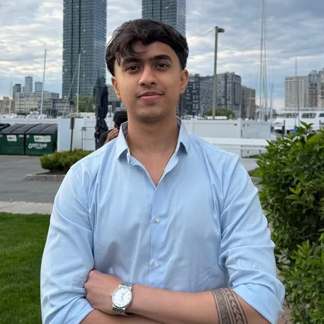 Yash Kamerkar outside by the waterfront